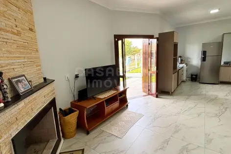 Imagem #3 do imóvel Casa de alto padrão com 4 dormitórios, piscina e espaço gourmet a 400 metros do mar