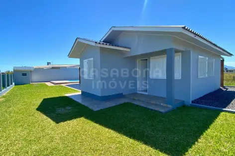 Imagem principal do Casa com 3 Dormitórios, 2 Banheiros Sociais e 2 Vagas de Garagem – Conforto e Funcionalidade