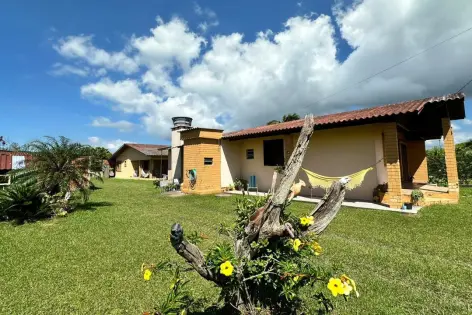 Imagem principal do Ótima Oportunidade em Arroio do Sal: Duas Casas em Terreno Amplo