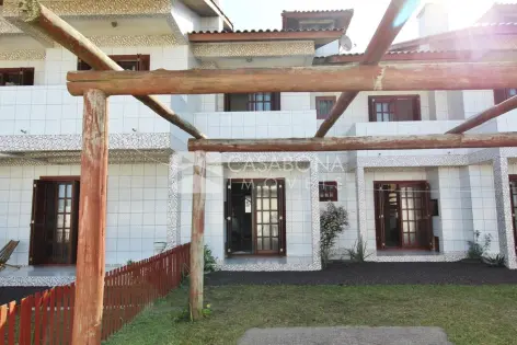 Imagem principal do Sobrado a 100 Metros do Mar: Conforto e Localização Privilegiada