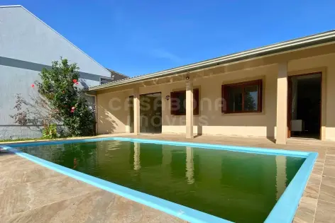 Imagem #3 do imóvel Casa térrea com piscina a apenas 200 metros do mar em Arroio do Sal Sul