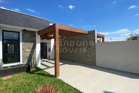 Imagem principal do Casa Geminada em Arroio do Sal - Bairro Pérola: Aconchego e Lazer a 100 Metros do Mar