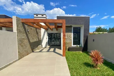 Imagem principal do Casa Geminada em Arroio do Sal – Conforto e Lazer a 100 Metros do Mar