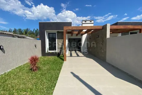 Imagem #2 do imóvel Casa Geminada em Arroio do Sal - Bairro Pérola: Aconchego e Lazer a 100 Metros do Mar