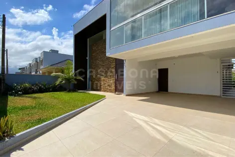 Imagem principal do Sobrado de Alto Padrão com 4 Dormitórios e Área de Lazer Completa em Arroio do Sal