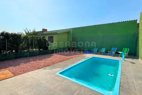 Imagem #4 do imóvel Casa com piscina a 300 metros do mar no Jardim Raiante