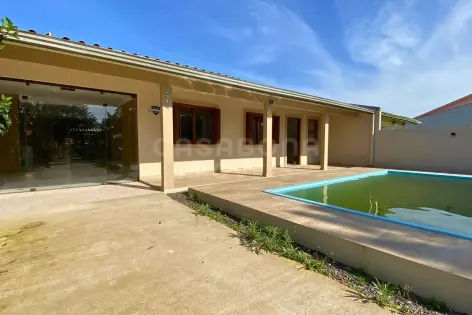 Imagem principal do Casa térrea com piscina a apenas 200 metros do mar em Arroio do Sal Sul