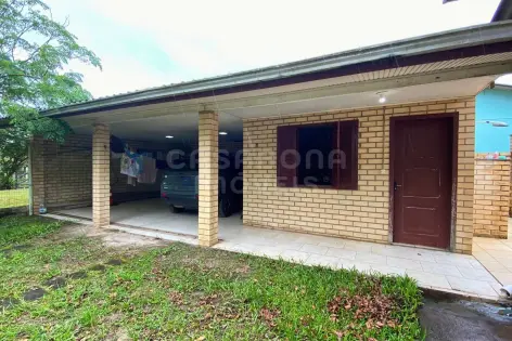 Imagem principal do Ampla Casa com Dois Terrenos Próxima ao Mar – Espaço, Conforto e Qualidade de Vida