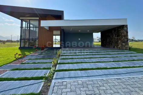 Imagem #1 do imóvel Casa Contemporânea no Condomínio Parque das Figueiras – Sofisticação e Conforto em Arroio do Sal