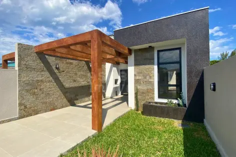 Imagem principal do Casa Geminada em Arroio do Sal – Conforto e Lazer a 100 Metros do Mar