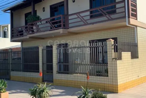 Imagem principal do Casa Ampla com 4 Dormitórios no Bairro Getúlio Vargas – Conforto, Espaço e Qualidade de Vida em Torres