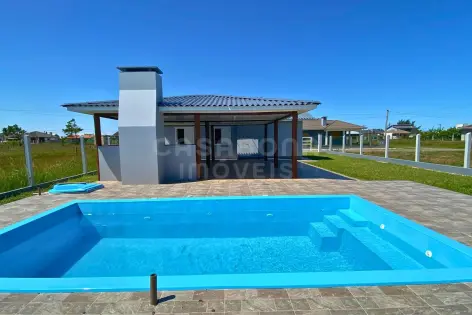 Imagem #2 do imóvel Casa com 3 Dormitórios, 2 Banheiros Sociais e 2 Vagas de Garagem – Conforto e Funcionalidade
