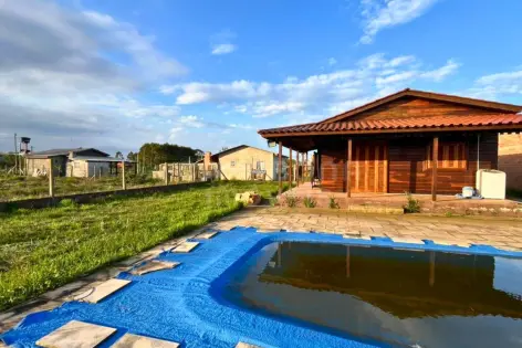 Imagem #4 do imóvel Casa de Madeira com Piscina e Suíte com Hidromassagem em Torres