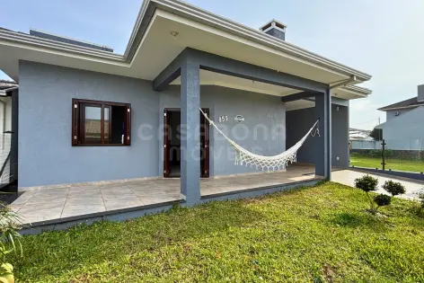 Imagem #1 do imóvel Casa de alto padrão com 4 dormitórios, piscina e espaço gourmet a 400 metros do mar