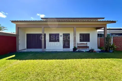 Imagem principal do Casa de Veraneio Confortável Próxima ao Centro e à Praia