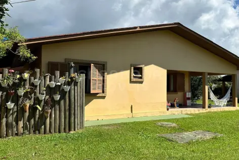 Imagem #4 do imóvel Ótima Oportunidade em Arroio do Sal: Duas Casas em Terreno Amplo