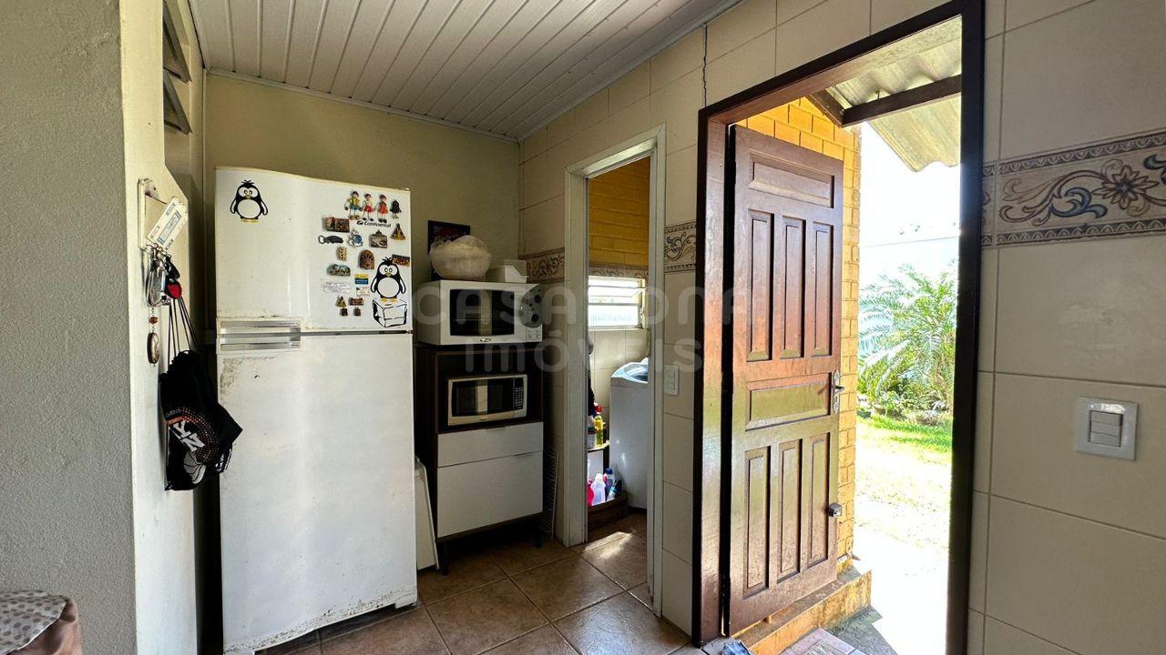 Ótima Oportunidade em Arroio do Sal: Duas Casas em Terreno Amplo