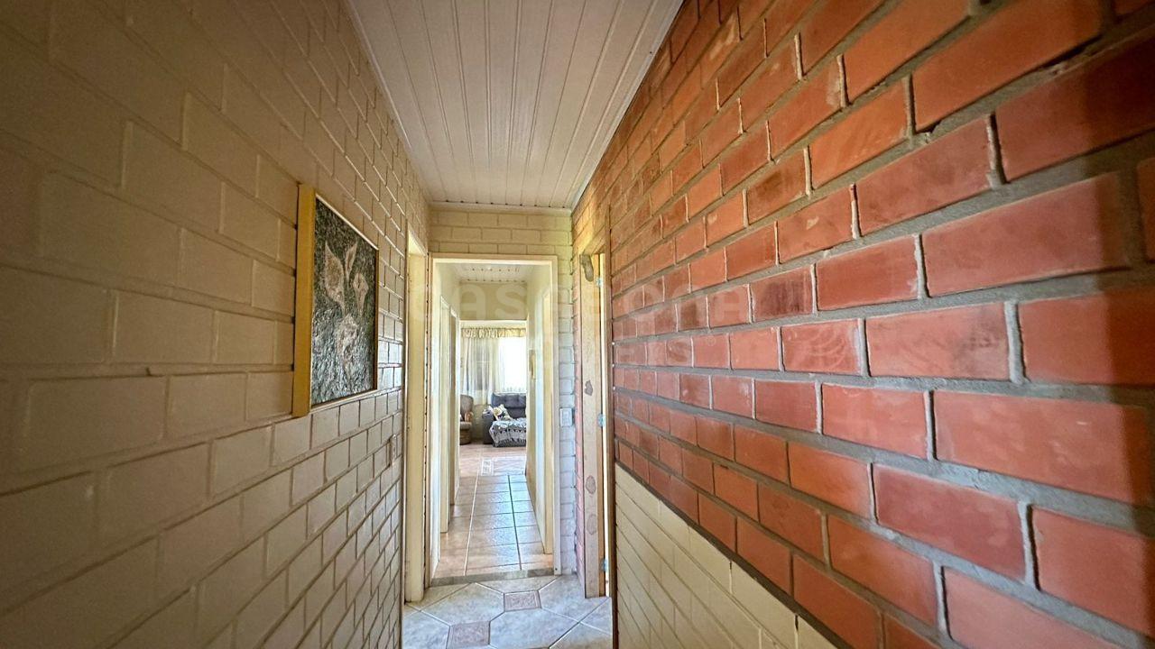 Ótima Oportunidade em Arroio do Sal: Duas Casas em Terreno Amplo