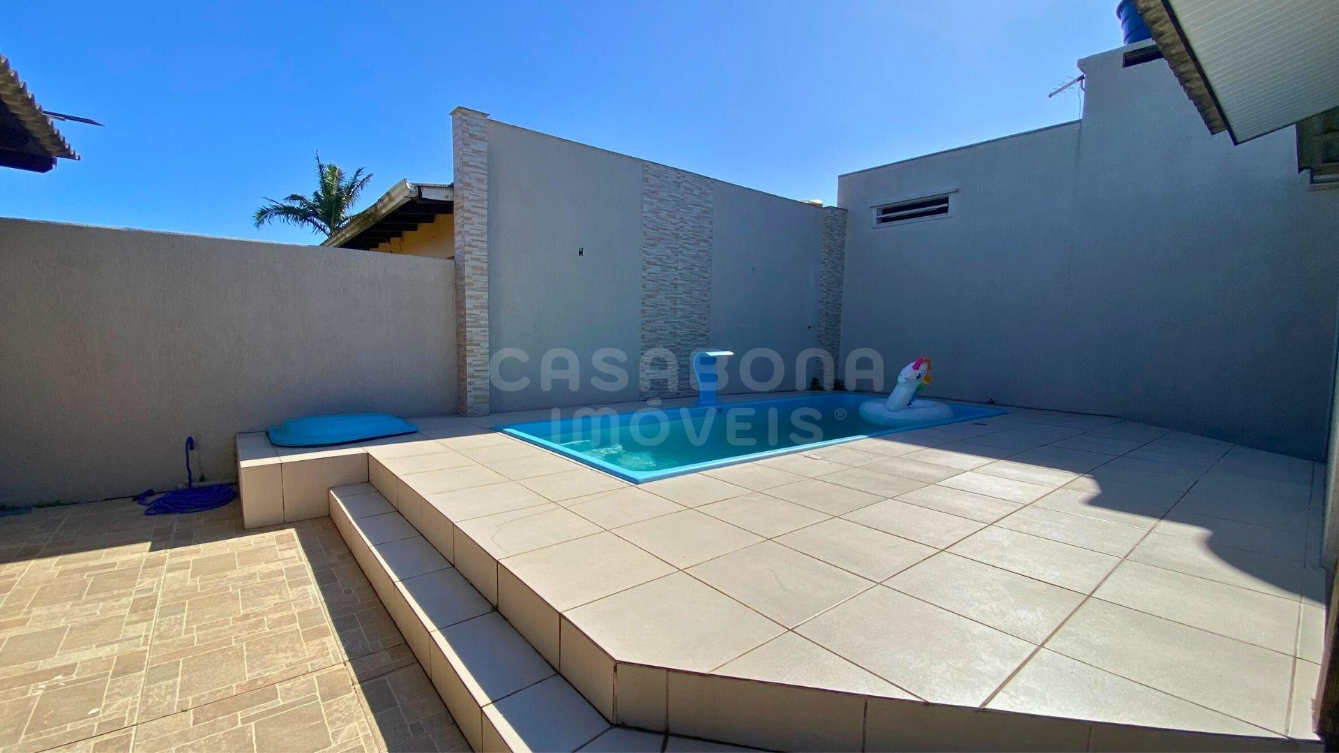 Casa moderna com piscina e quiosque no bairro Verde Mar em Arroio do Sal
