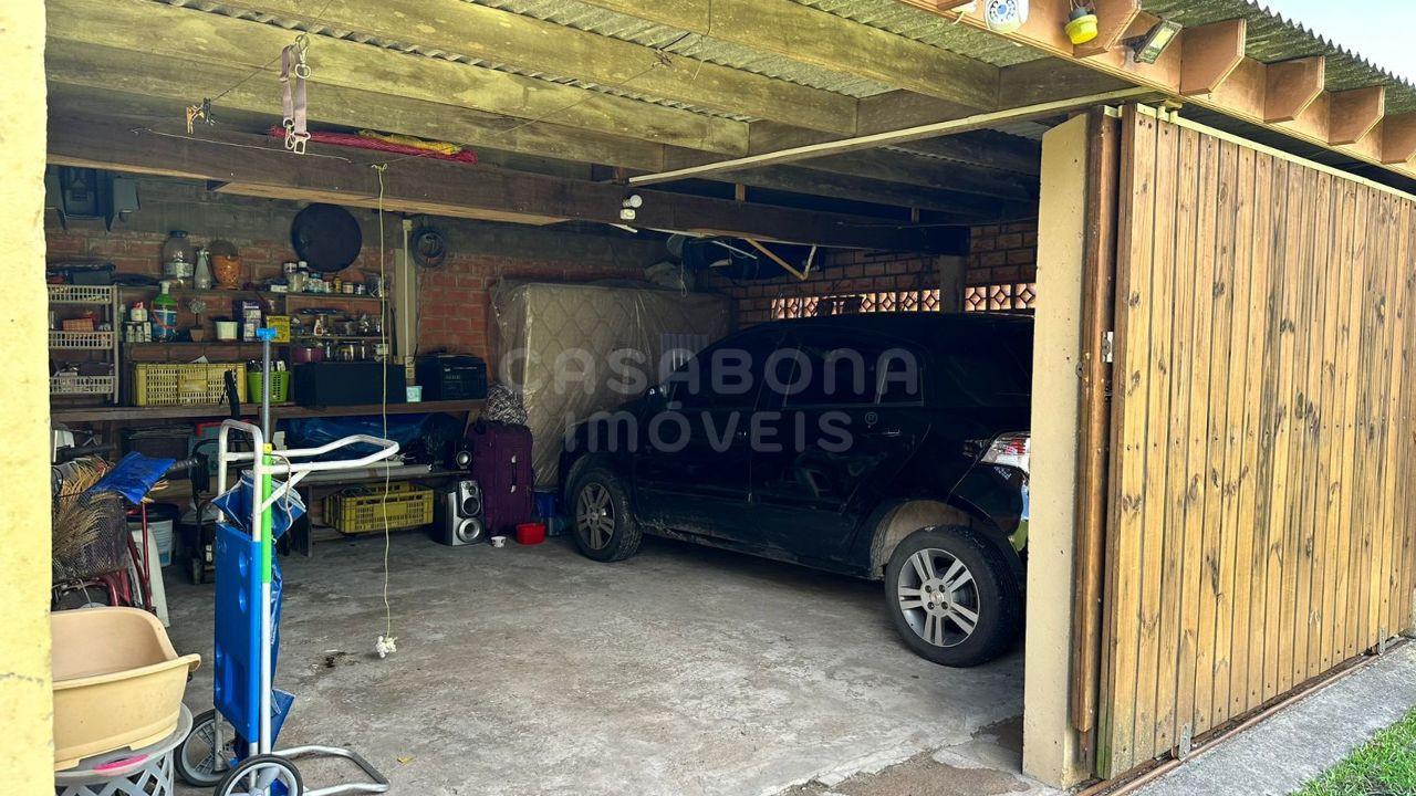 Ótima Oportunidade em Arroio do Sal: Duas Casas em Terreno Amplo