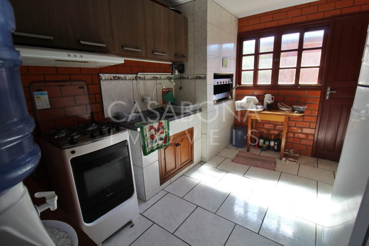 Residência Encantadora em Tijolo à Vista: Amplo Pátio e Proximidade do Mar