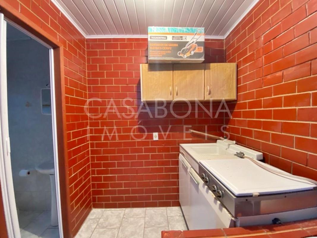 Residência Encantadora em Tijolo à Vista: Amplo Pátio e Proximidade do Mar