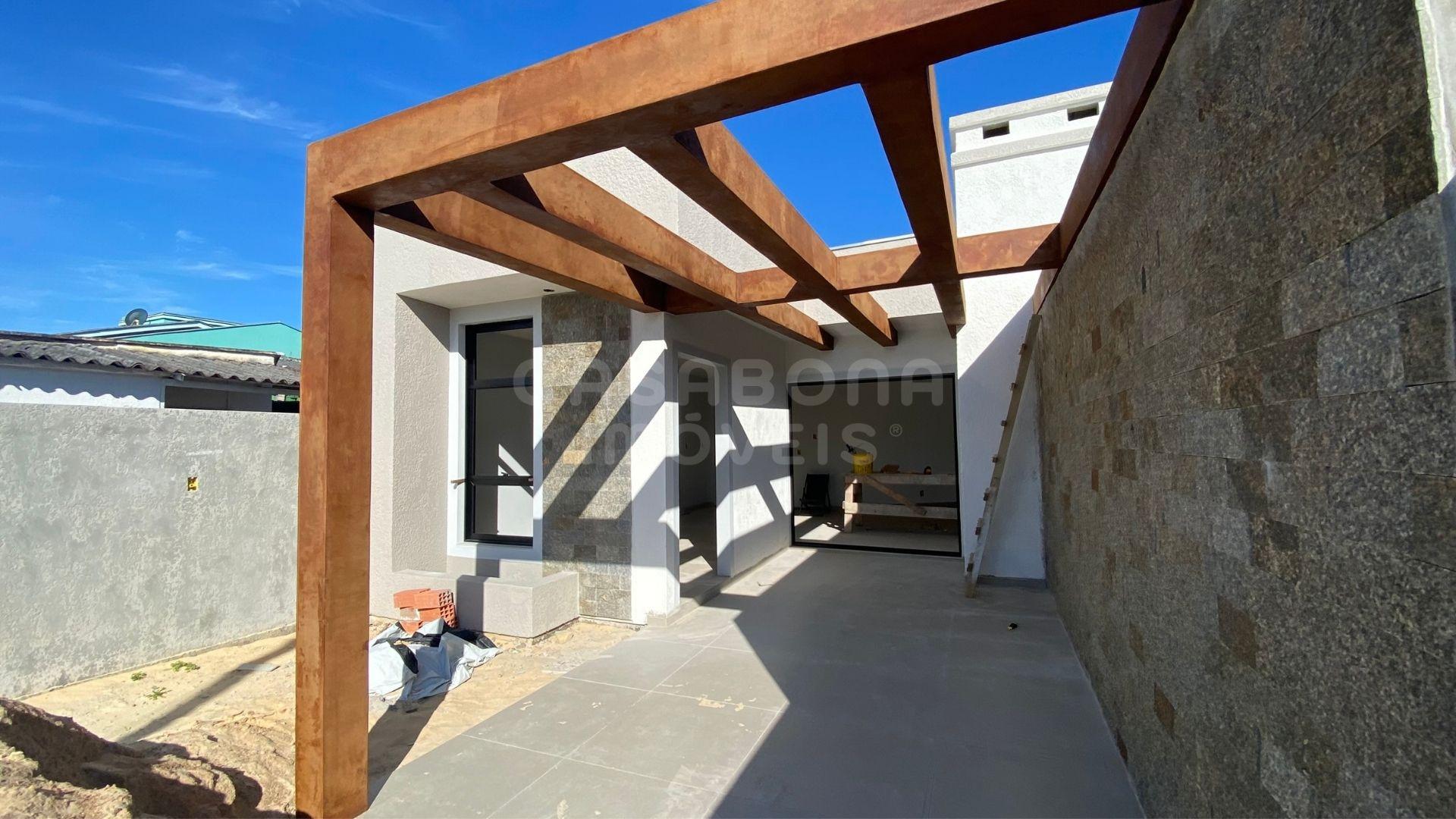 Casa Geminada em Arroio do Sal – Conforto e Lazer a 100 Metros do Mar