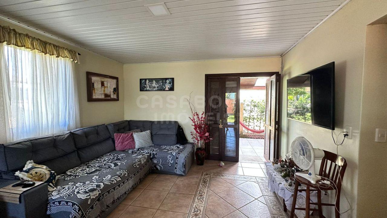 Ótima Oportunidade em Arroio do Sal: Duas Casas em Terreno Amplo