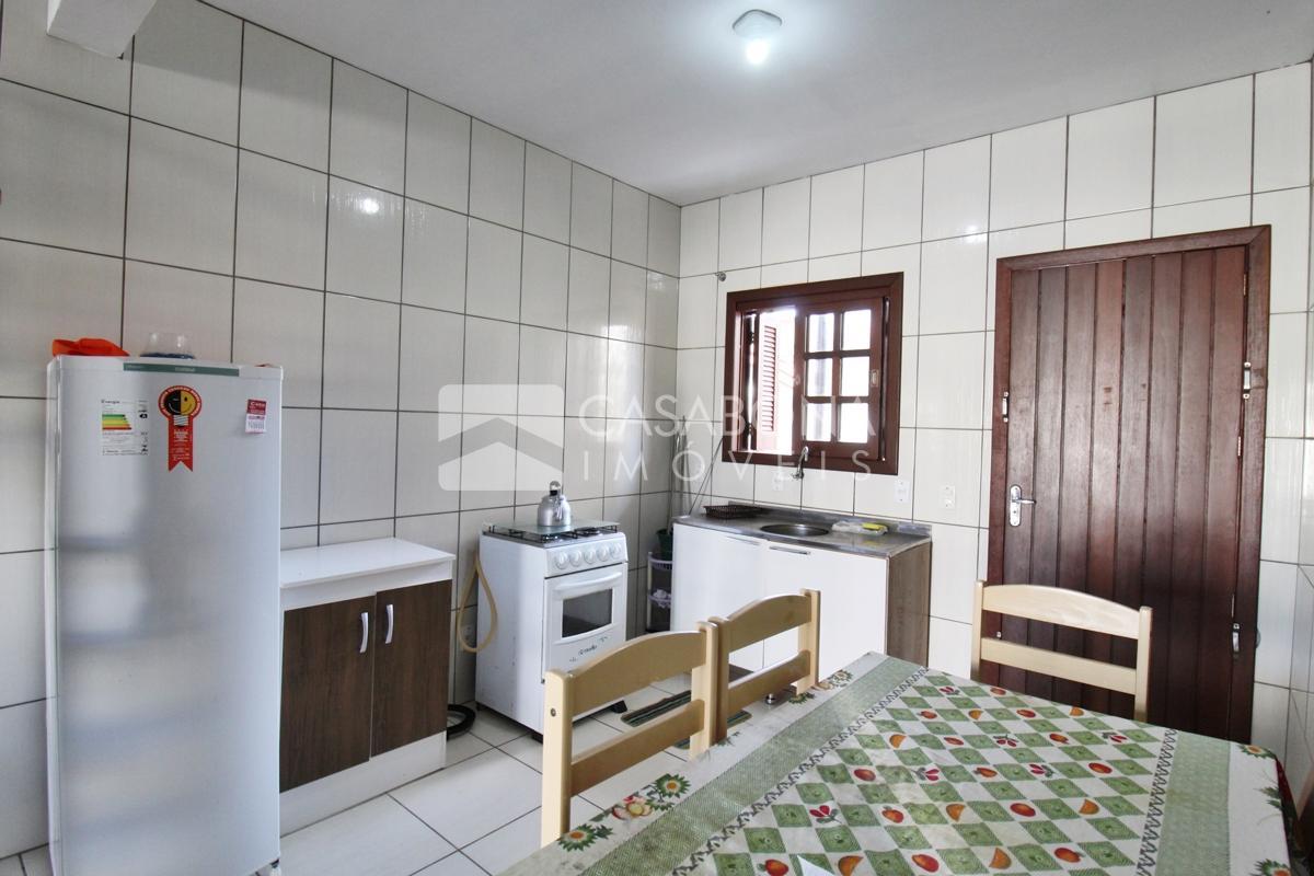 Sobrado a 100 Metros do Mar: Conforto e Localização Privilegiada