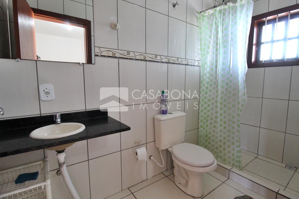 Sobrado a 100 Metros do Mar: Conforto e Localização Privilegiada