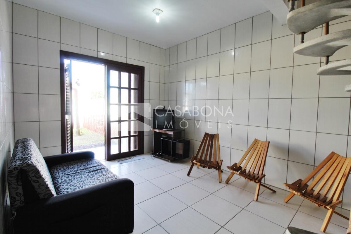 Sobrado a 100 Metros do Mar: Conforto e Localização Privilegiada