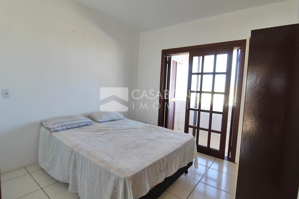 Sobrado a 100 Metros do Mar: Conforto e Localização Privilegiada